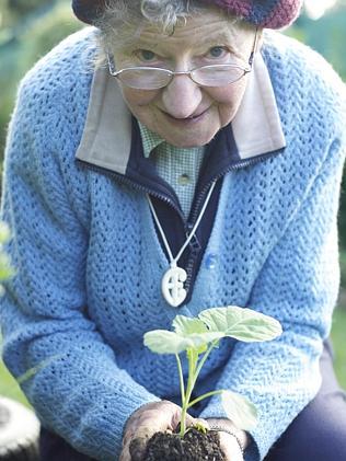 Sister Loyola works in her garden in Gardening With Soul.