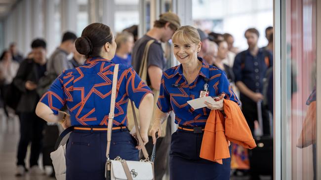 Jetstar staff wearing the new uniform at Adelaide Airport. Picture Emma Brasier