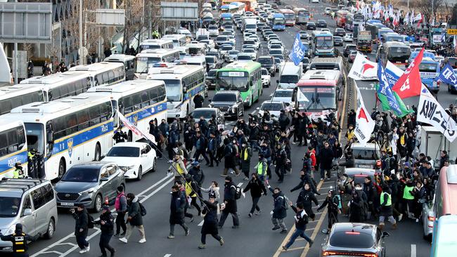 Members of the Korean Confederation of Trade Unions gather along a street during a protest against Mr Yoon. Picture: Getty Images