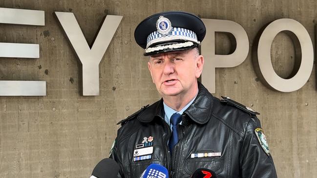 Assistant Commissioner Brett McFadden addressing media outside Surry Hills police station.