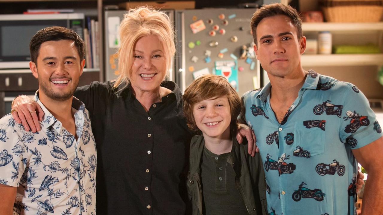 Takaya Honda (L) fondly remembers the storyline of being a foster care father on Neighbours, directed by Deborra-Lee Furness . Picture: Supplied