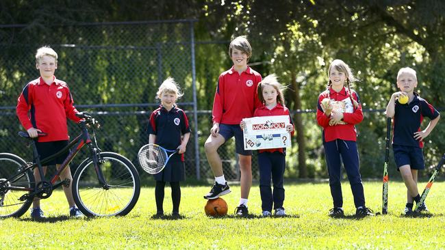 South Hobart Primary student, from left, Patrick George, 10, Alice George, 5, Leo Thomas, 10, Zoe Thomas, 6, Eva Thomas, 8, and Oskar Kudelka getting ready for a month of "low-tech" or "no-tech" recreational activity. Picture: KIM EISZELE