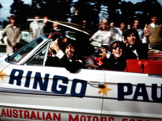 Music group ‘The Beatles’ band members in Ford motor car on North Terrace, Adelaide, South Australia 1964. Picture: Bill Ferme