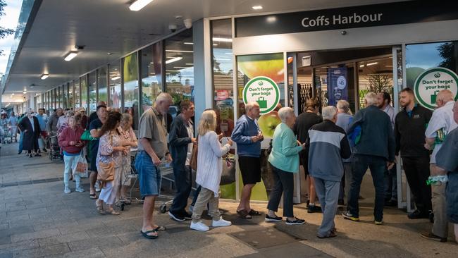 Elderly residents queue outside the Woolworths store at Coffs Harbour. Picture: Trevor Veale