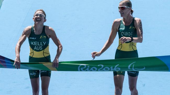 Australia's Katie Kelly (left) touches a goal tape with her guide Michellie Jones at the Rio 2016 Paralympic Games. Picture: AFP