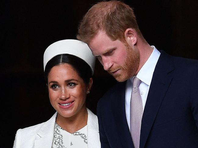 (FILES) In this file photo taken on March 11, 2019 Britain's Prince Harry, Duke of Sussex (R) and Meghan, Duchess of Sussex leave after attending a Commonwealth Day Service at Westminster Abbey in central London. - Prince Harry will produce a documentary about the Invictus Games for disabled military veterans -- the first series under a lucrative deal he and  wife Meghan Markle signed with Netflix after moving to California last year.  Harry, who served with the British military in Afghanistan, will appear on camera and executive-produce "Heart of Invictus," a multi-episode series which follows competitors as they train for next spring's competition in The Hague. (Photo by Ben STANSALL / AFP)