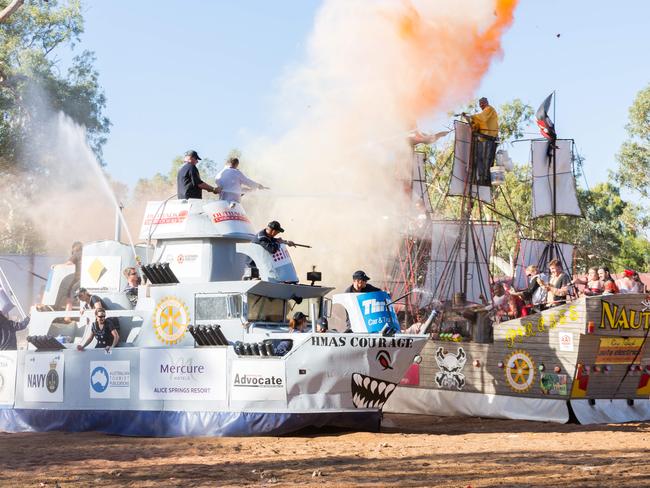 The infamous Henley on Todd Battle of the Boats was fought out between the Pirates, Vikings, and Navy boats, with the Vikings crowned the winners. Alice Springs August 19 2017. Photo: EMMA MURRAY