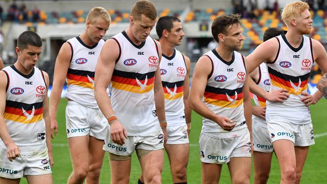 Adelaide Crows players after losing to Brisbane Lions at the Gabba.