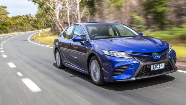 German Holden Commodore takes on new Toyota Camry and updated Subaru ...