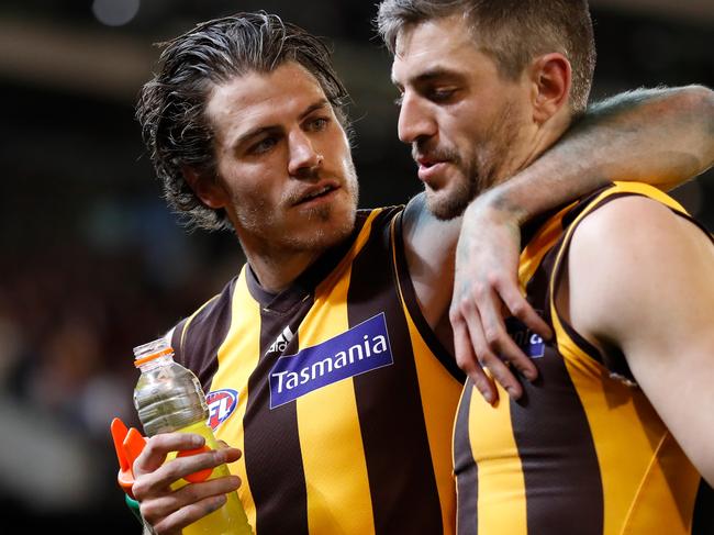 MELBOURNE, AUSTRALIA - SEPTEMBER 14: Isaac Smith of the Hawks (left) and Ricky Henderson of the Hawks (right) look dejected after a loss during the 2018 AFL First Semi Final match between the Hawthorn Hawks and the Melbourne Demons at the Melbourne Cricket Ground on September 14, 2018 in Melbourne, Australia. (Photo by Michael Willson/AFL Media/Getty Images)