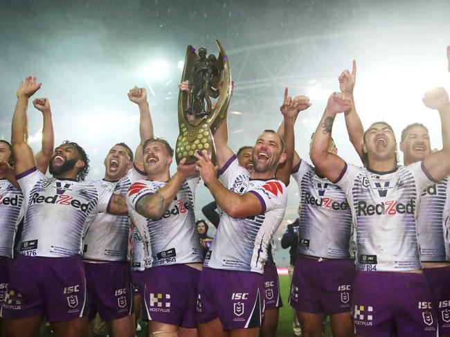 Melbourne celebrates winning the 2020 NRL grand final at ANZ Stadium. Picture: Cameron Spencer/Getty