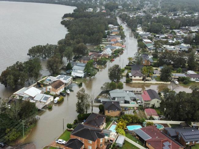 Images of Chittaway Bay as residents face a nervous night. Picture: Shannon Schloff