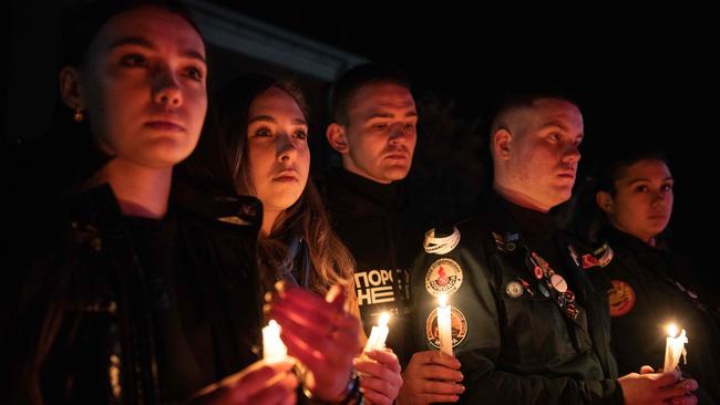 People light candles during a memorial gathering in Donetsk, Russian-controlled Ukraine, as Russia observes a national day of mourning. Picture: AFP