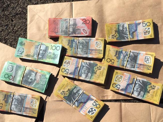 Some of the cash allegedly seized by police during raids on Monday and Tuesday.