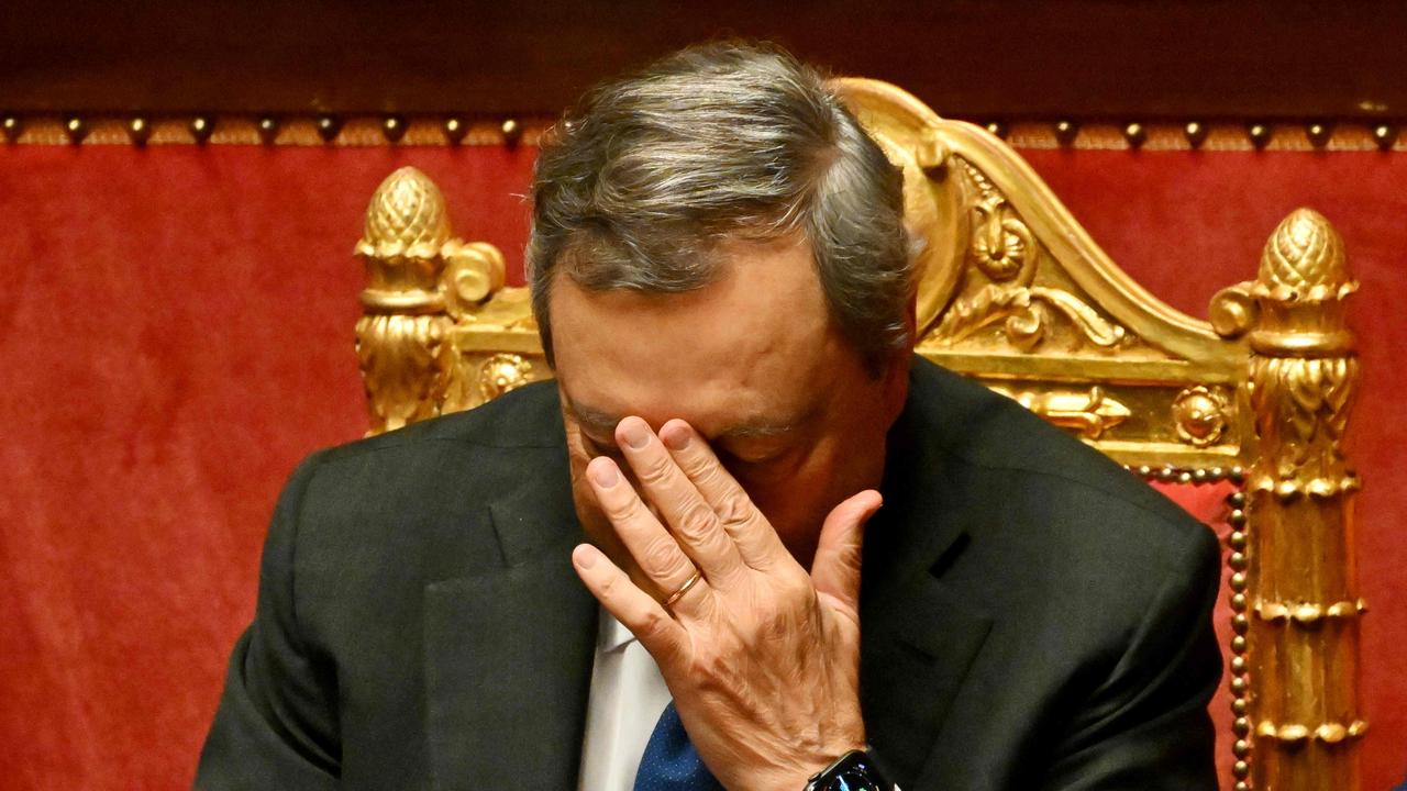 Italy's Prime Minister Mario Draghi reacts during the debate on government crisis following his resignation. (Photo by Andreas SOLARO / AFP)