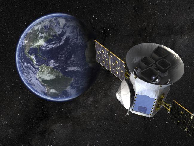 This image made available by NASA shows an illustration of the Transiting Exoplanet Survey Satellite (TESS). Scheduled for an April 2018 launch, the spacecraft will prowl for planets around the closest, brightest stars. These newfound worlds eventually will become prime targets for future telescopes looking to tease out any signs of life. (NASA via AP)