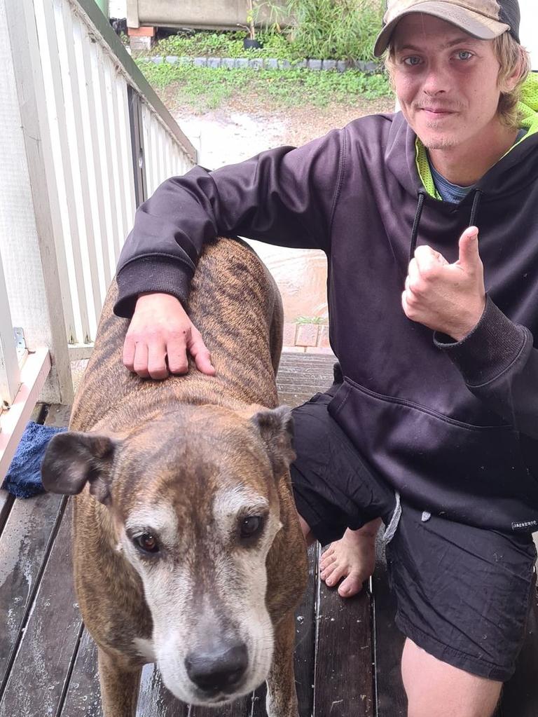 Laidley resident Kayne Muller and his great dane Azaura, who were both rescued after their Old Mulgowrie Road home was flooded in the early hours of May 13, 2022.