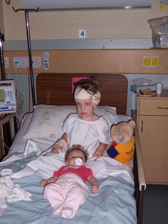 Laura after her first cochlear implant surgery when she was four years old in 2005. Picture: Supplied