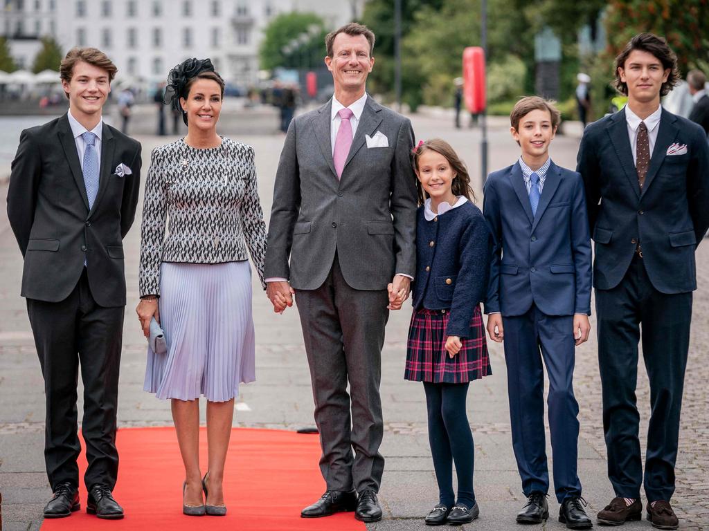 Left to right: Prince Felix, Princess Marie, Prince Joachim, Princess Athena, Prince Henrik and Prince Nikolai arrive for a luncheon on the Dannebrog Royal Yacht. Pictured in 2022 before their kids’ titles were stripped. Picture: AFP