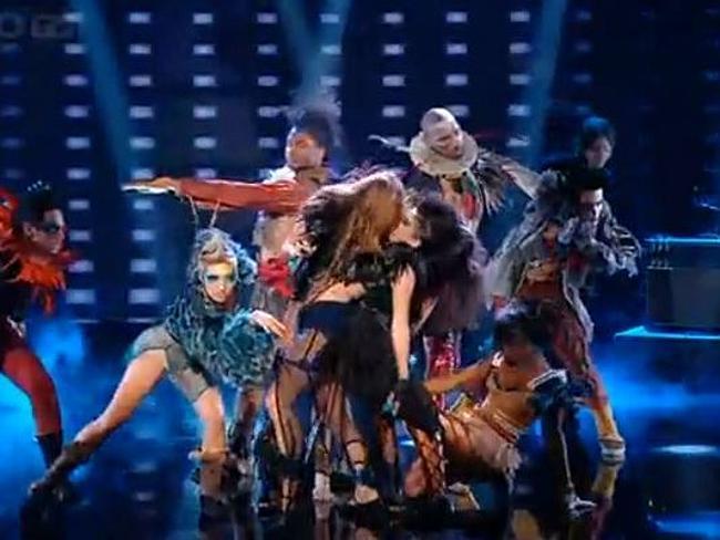 Miley Cyrus' next trick was to lock lips with a female dancer during a performance on Britain's Got Talent, June 3, 2010. Picture: YouTube