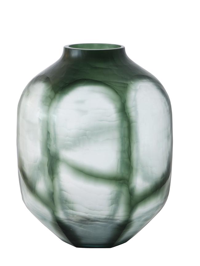 Make a statement with handcrafted glass vases.