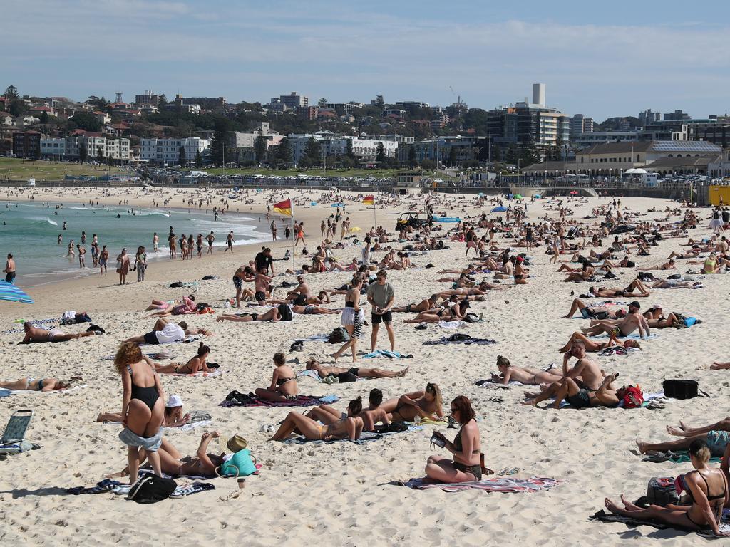 Social distancing on Bondi Beach. Picture John Grainger