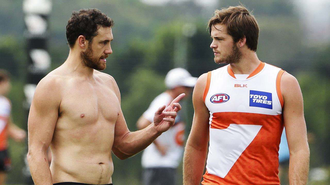 Shane Mumford and Matthew Flynn, right, at Giants training in 2017. Picture: Justin Lloyd