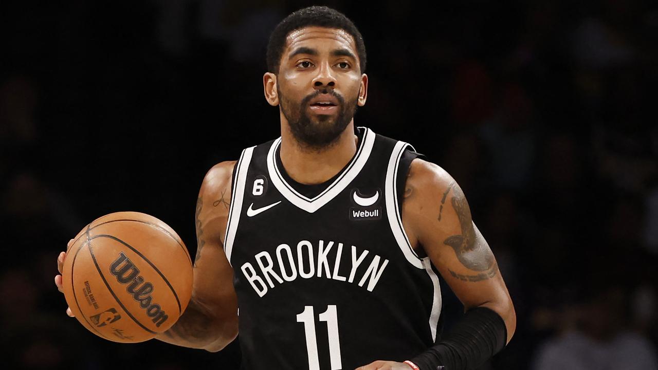 NEW YORK, NEW YORK - JANUARY 30: Kyrie Irving #11 of the Brooklyn Nets dribbles during the second half against the Los Angeles Lakers at Barclays Center on January 30, 2023 in the Brooklyn borough of New York City. The Nets won 121-104. NOTE TO USER: User expressly acknowledges and agrees that, by downloading and/or using this photograph, User is consenting to the terms and conditions of the Getty Images License Agreement. Sarah Stier/Getty Images/AFP (Photo by Sarah Stier / GETTY IMAGES NORTH AMERICA / Getty Images via AFP)