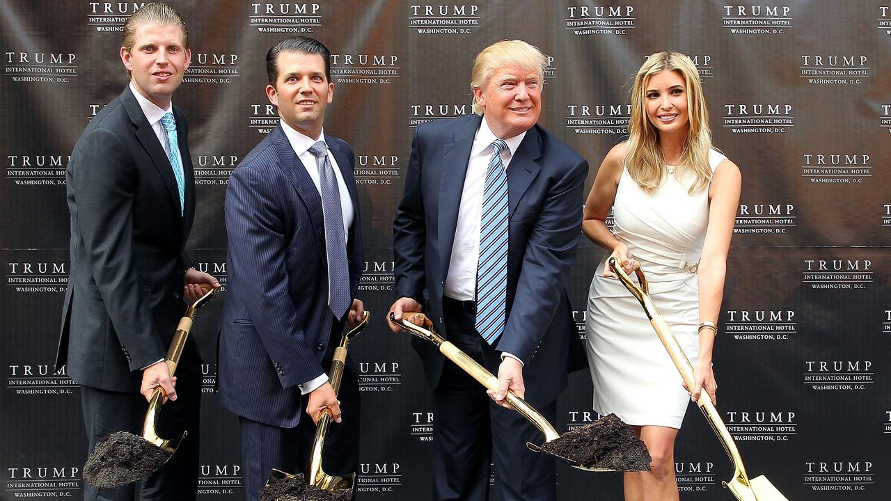 Donald Trump, along with his children Eric, Donald Jr and Ivanka, breaking ground at the Trump International Hotel in Washington, D.C. in July, 2014. Picture: Paul Morigi/WireImage