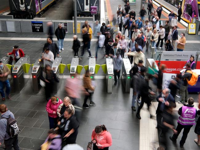 MELBOURNE, AUSTRALIA - NewsWire Photos DECEMBER 13, 2022: Photo commuters at Southern Cross train station.Picture: NCA NewsWire / Luis Enrique Ascui