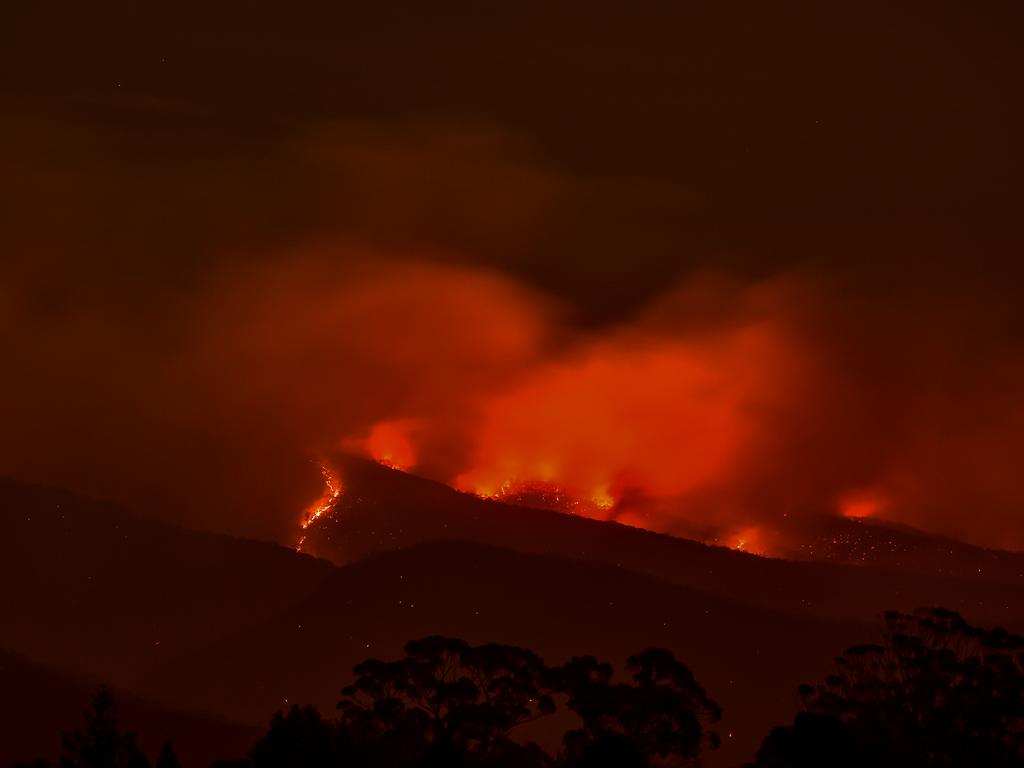 Mt Tomah Botanical Gardens suffered damage from the Gospers Mountain Fire Sunday evening gas it travelled from Mt Wilson east towards Bilpin. Early hours of the morning the fire front can be seen burning out of control in the valleys to the east of the gardens. Picture: Matrix