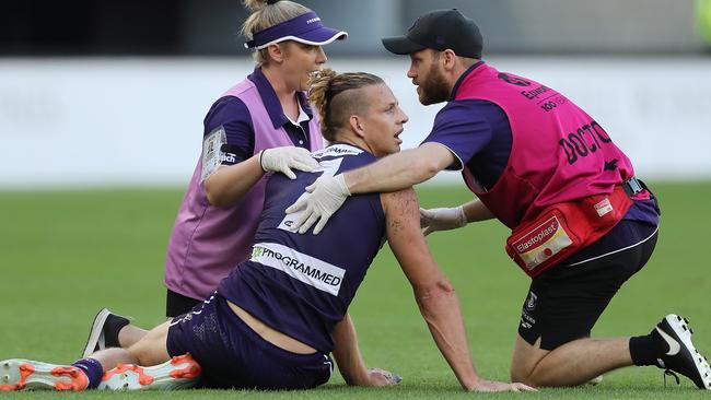 Nat Fyfe was subbed off after the hit from Sam Reid.