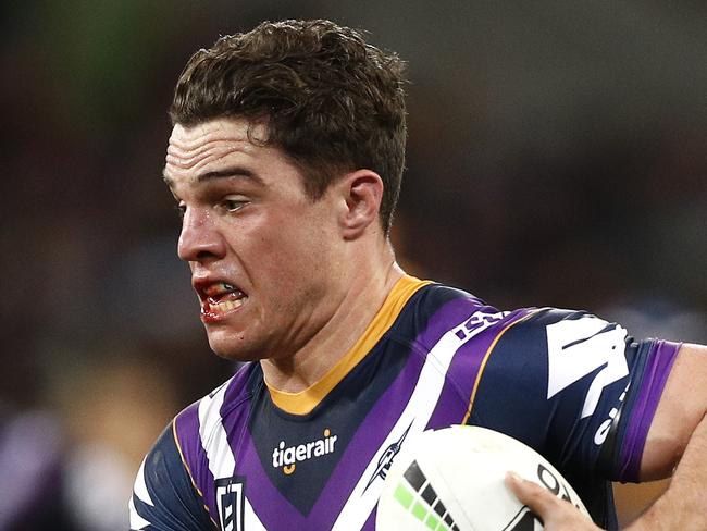 MELBOURNE, AUSTRALIA - SEPTEMBER 06:  Brodie Croft of the Storm is tackled during the round 25 NRL match between the Melbourne Storm and the North Queensland Cowboys at AAMI Park on September 06, 2019 in Melbourne, Australia. (Photo by Daniel Pockett/Getty Images)