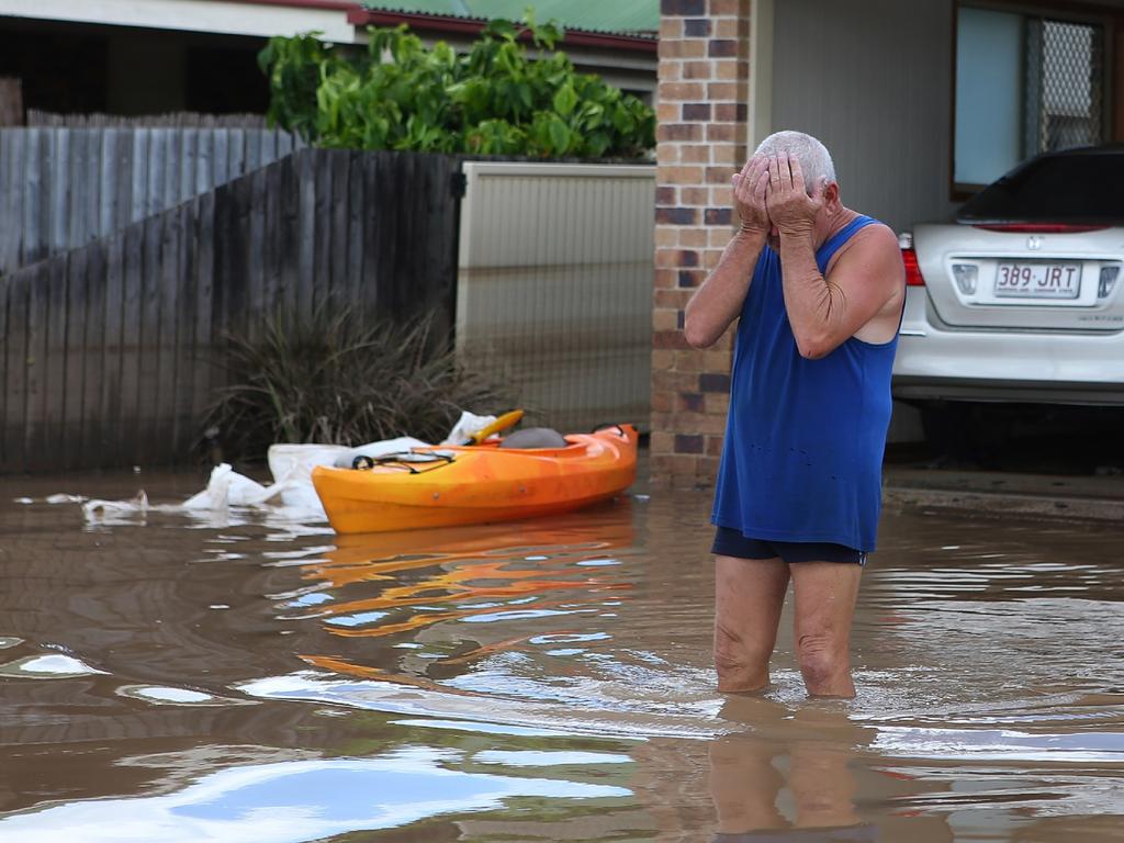 30/01/2013 WIRE: BUNDABERG, AUSTRALIA - JANUARY 30: A resident reacts to the damage to his house as parts of southern Queensland experiences record flooding in the wake of Tropical Cyclone Oswald on January 30, 2013 in Bundaberg, Australia. (Photo by Chris Hyde/Getty Images) Pic. Getty Images.