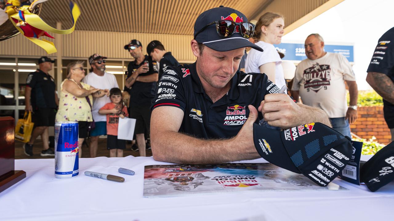 Supercar champion Will Brown signing autographs at Cars Galore in Toowoomba, Sunday, November 24, 2024. Picture: Kevin Farmer