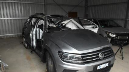 The mangled wreck of the Volkswagen Tiguan wagon driven by Adrian Charles Rawlings.