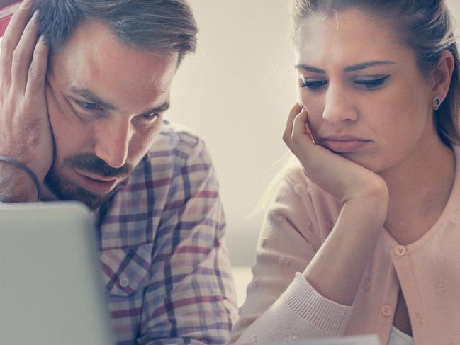 A couple having problem with bills and money. Generic relationships, laptop, expenses. Picture: iStock.