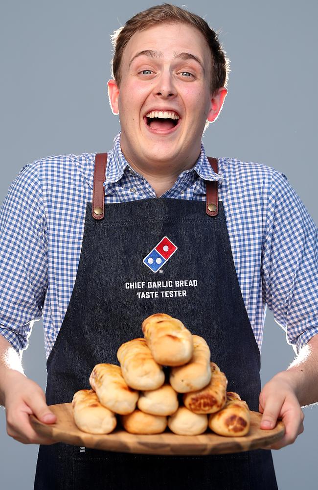 Zach Gracie, 21, from Brisbane has beaten 7500 people to take out Domino's first ever Chief Garlic Bread Taste Tester. Picture: Peter Wallis