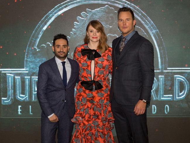 Pratt and Howard with Spanish director JA Bayona (left) at the Madrid premiere of their new movie. Picture: Universal Pictures