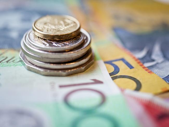 Stack of Australian dollars, cash money generic