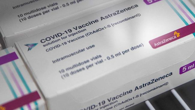 (FILES) In this file photo taken on January 09, 2021 Boxes of vials of the Oxford/AstraZeneca Covid-19 vaccine are seen in a refrigerator at Ashton Gate Stadium in Bristol, one of seven mass vaccination centres which are set to open next week as Britain continues its vaccination programme against Covid-19. - AstraZeneca's Covid jab has won approval for use as a booster or third jab in the European Union, the British drugs giant confirmed on May 23, 2022. (Photo by Andrew Matthews / POOL / AFP)