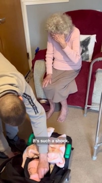 Couple surprises Nan with her new great grandchild