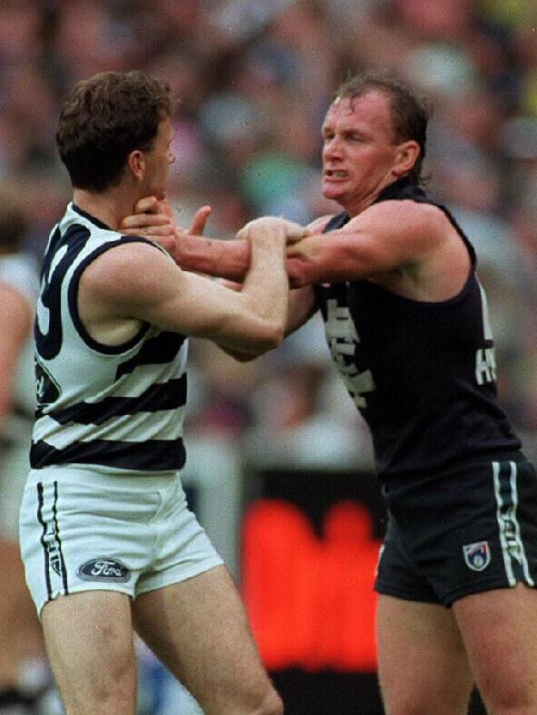 Ken Hinkley and Craig Bradley tangle in the 1995 Grand Final. Picture: Michael Keating