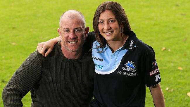 Boxer and former NRL player Garth Wood with daughter Mia, 17, who is starring in both rugby league and rugby union.
