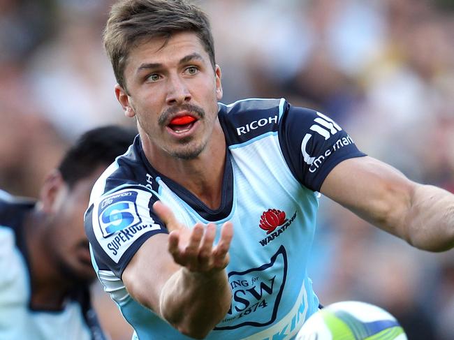 QUEENSTOWN, NEW ZEALAND - FEBRUARY 19: Jake Gordon of the Waratahs passes the ball during the Super Rugby trial match between the Highlanders and the Waratahs at the Queenstown Recreation Ground on February 19, 2016 in Queenstown, New Zealand. (Photo by Rob Jefferies/Getty Images)