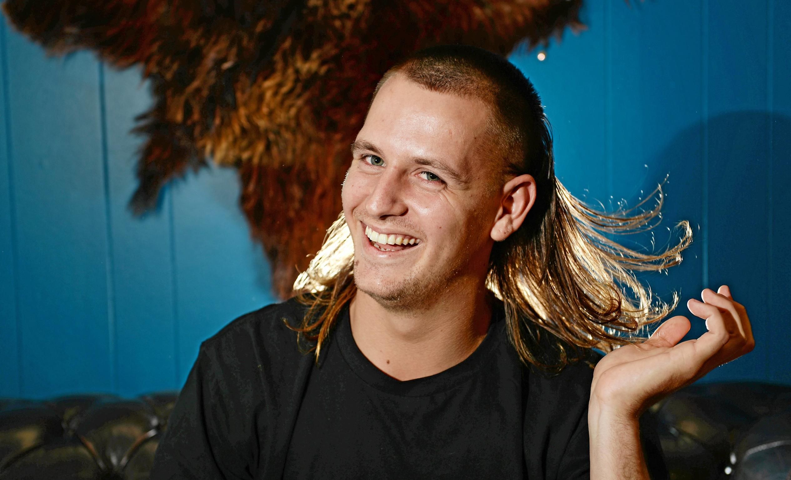 The Mullet is making a comeback in Mackay. Jai Gurr getting his Mullet styled by Andrew Folwell at Gold Empire Tattoo and Hair in Mackay. Picture: Stuart Quinn