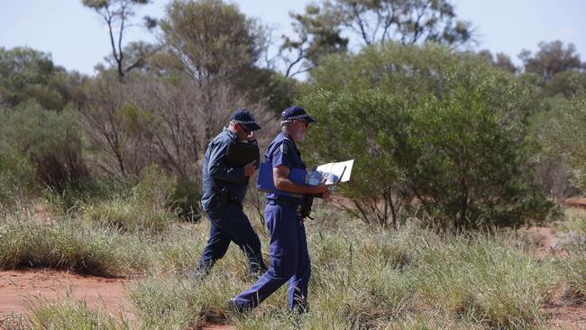 Crime Scene investigators near Fregon in the APY Lands. Picture: Simon Cross