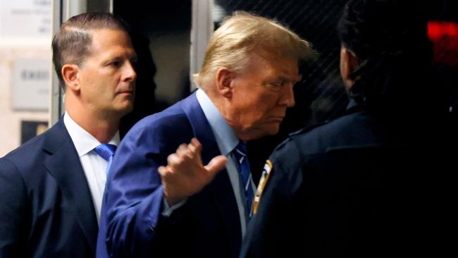 Former President Donald Trump returns to the courtroom after a break during the second day of his criminal trial at Manhattan Criminal Court. Picture: Getty Images via AFP.