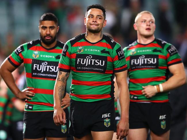 Robert Jennings, John Sutton and George Burgess of the Rabbitohs wore black arm bands in honour of Mr Taylor in their NRL Preliminary Final match against the Sydney Roosters on Saturday. Picture: Mark Kolbe/Getty Images