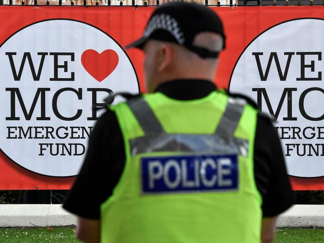 Police officers patrol around Old Trafford Cricket Ground ahead of the One Love Manchester tribute concert in Manchester on June 4, 2017. Picture: Anthony Devlin/AFP